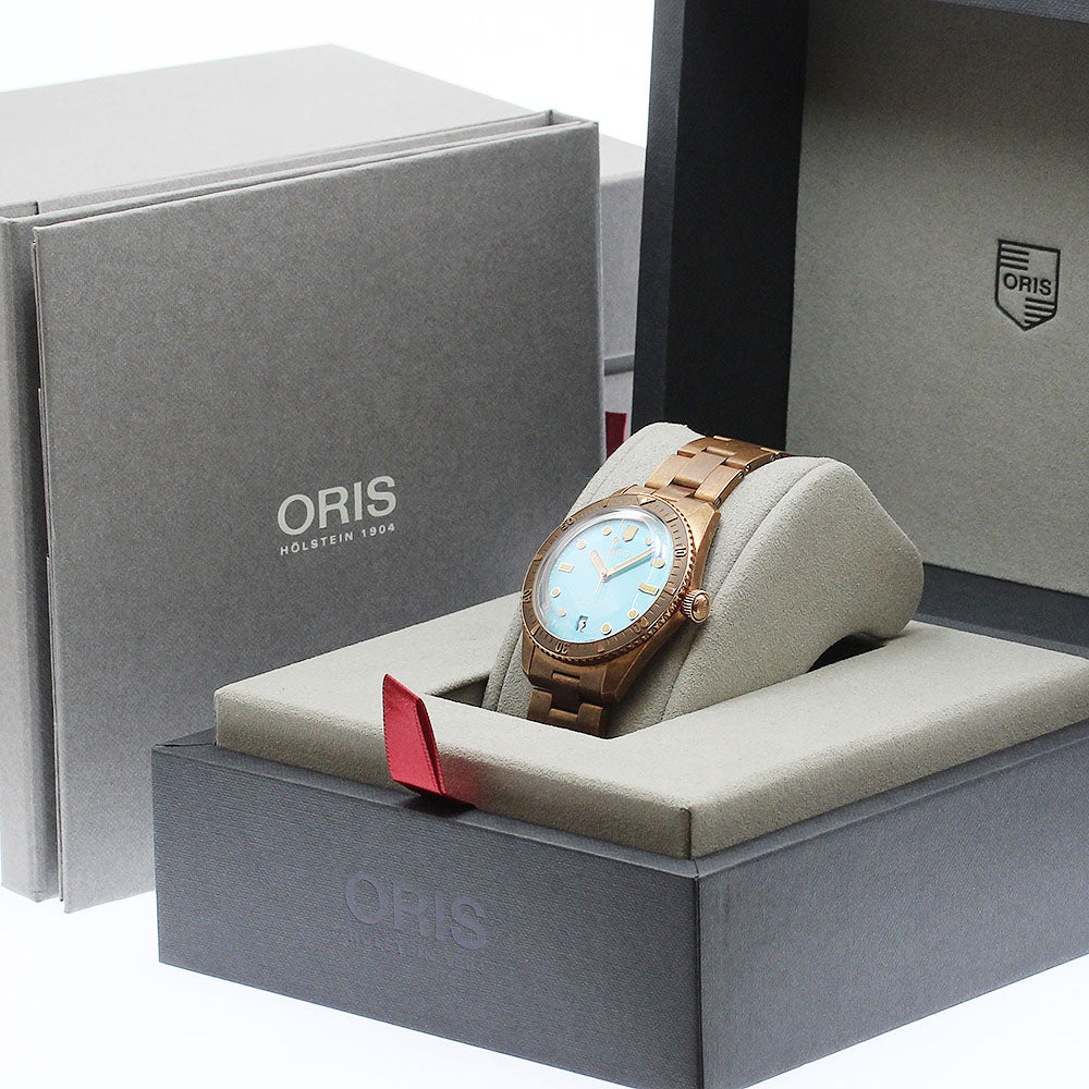 ORIS 01 733 7771 3155 Divers Sixty-Five Cotton Candy Date Automatic Men's Watch Excellent Condition with Box and Warranty.